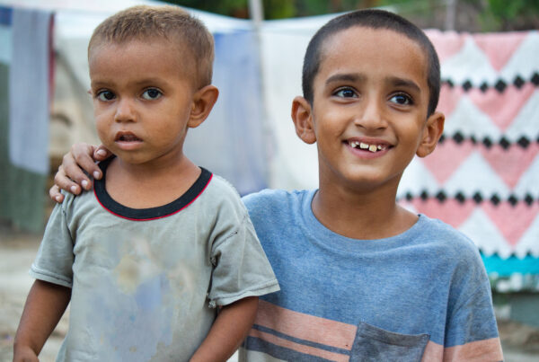 Freedom from Torture: Two Young Boys in a Refugee Camp